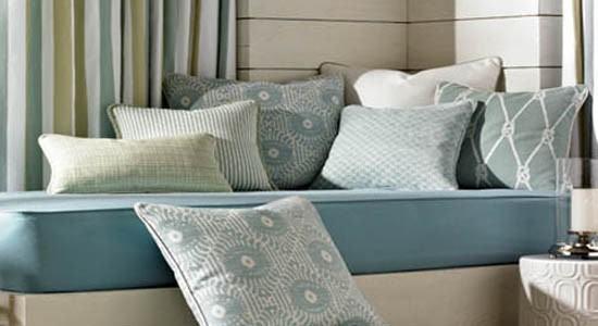 aqua throw pillows in Barclay Butera fabric by Kravet