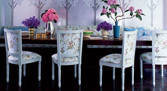 Cole & Son Fabric white chairs with a floral print fabric 