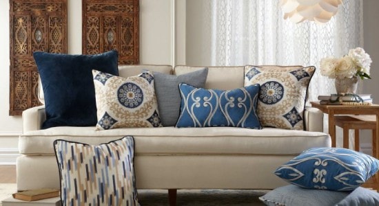 Stout Fabric used in a living room. Elegant patterns used on throw pillows. 