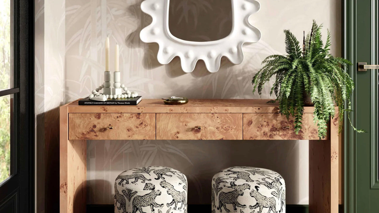 entryway and foyer with burl console and unique white mirror and 2 ottomans; tov dex leopard ottoman