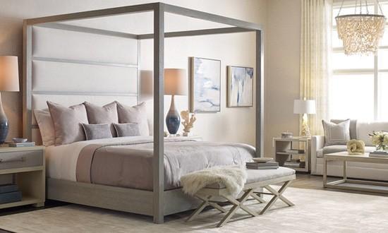 noir bed canopy grey white bedroom, bedframes, four poster bed, canopy beds, white area rug, neutral bedroom design, beaded chandelier, grey throw pillows, cream upholstered sofa, grey bench seating, blue grey table lamp, cream bedside tables