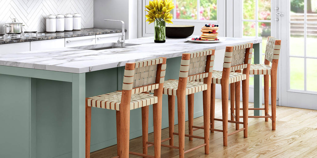 woven back counter stools, kitchen island stools, marble countertops, seafoam cabinets, wood legged counter stools, barstools, eat in kitchen stools