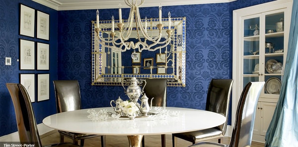 Blue damask wallpaper in a dining room by Lynne Scalo featured in Elle Decor