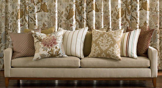 Kravet Fabric, A kravet couch with throw pillows all using elegant kravet patterns.