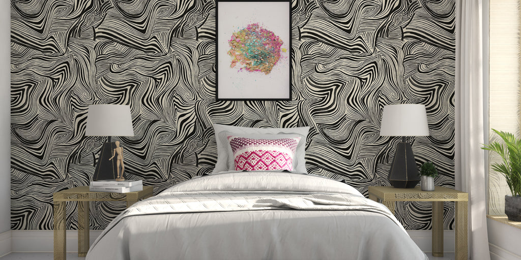 black and white wallpaper, db by decoratorsbest peel and stick wallpaper, abstract stripe wallpaper, black white and pink bedroom, grey bedding,  dark grey table lamps, rustic bedside tables, colorful wall art in black frame, peel and stick wallpaper