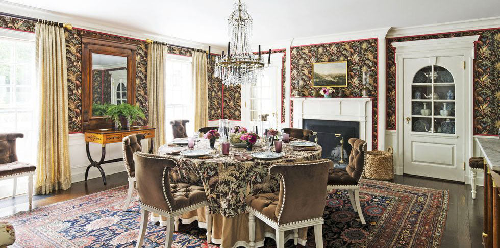 Brown dining room, brown floral dining room, Veranda Markham Robert's Dining Room, brown and black design, traditional area rug, gold glass bead chandelier lighting, wooden framed mirror, tan drapery fabric, black and brown tablecloth, brown chairs