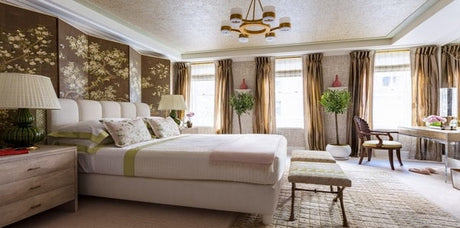 Brown bedroom with Asian screen by Brian Del Toro for Kips Bay NYC 2018, brown and pink bedroom, brown and pink design, gold pendant lighting, brown drapery fabric, brown bench seating, wood bedside table, tan area rug, brown table lamps, wood vanity