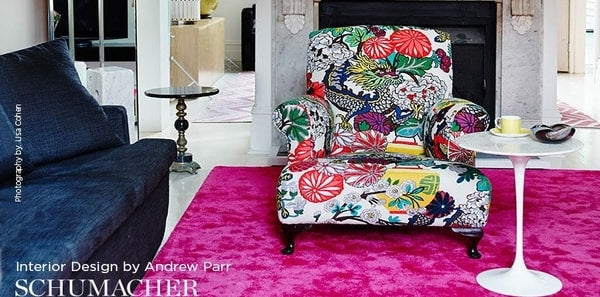 Schumacher Chiang Mai Dragon fabric on a club chair