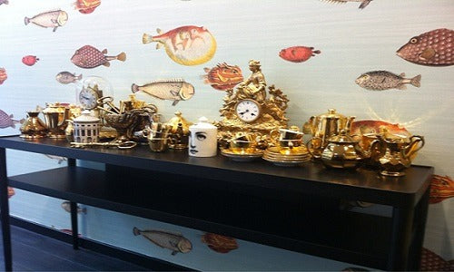 Cole and Son wallpaper black table golden cup