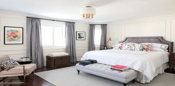 Grey bedroom with pink accents