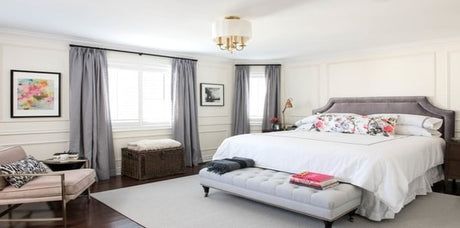 Grey bedroom with pink accents