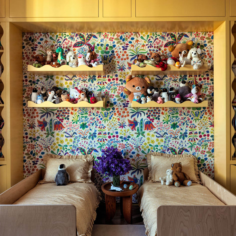 Stylish kids room with playful wallpaper, cozy furnishings, soft textures, and bright natural light creating a warm and inviting space; multi color floral wallpaper