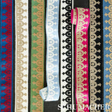 Schumacher Red On Blue Noelia Embroidered Tape