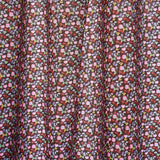 Schumacher Calico Multi On Brown Fabric