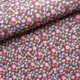 Schumacher Calico Multi On Brown Wallpaper