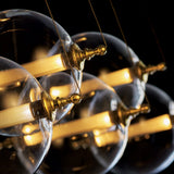 Hubbardton Forge 2017 Black with Brass Accents Clear Glass with Stainless Steel Mesh Tube (YT) Standard Otto Sphere 5 Light Pendant