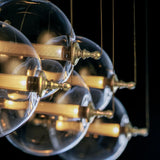 Hubbardton Forge 2017 Black with Brass Accents Clear Glass with Stainless Steel Mesh Tube (YT) Standard Otto Sphere 5 Light Pendant