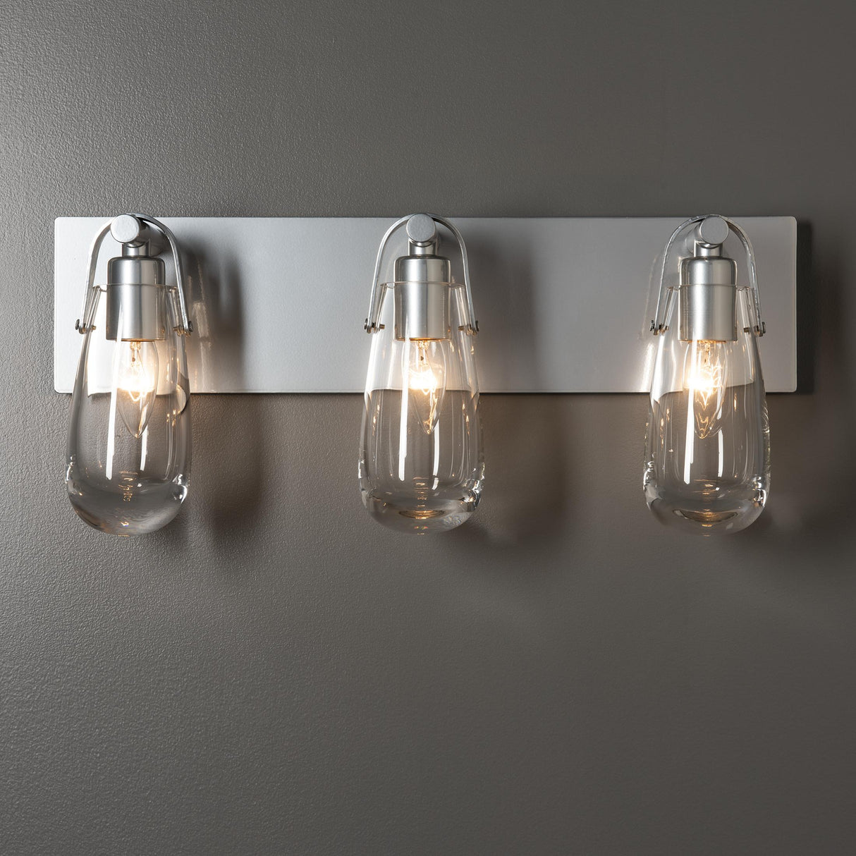 Hubbardton Forge 2022 Sterling Clear Glass (ZM) Eos 3-Light Bath Sconce