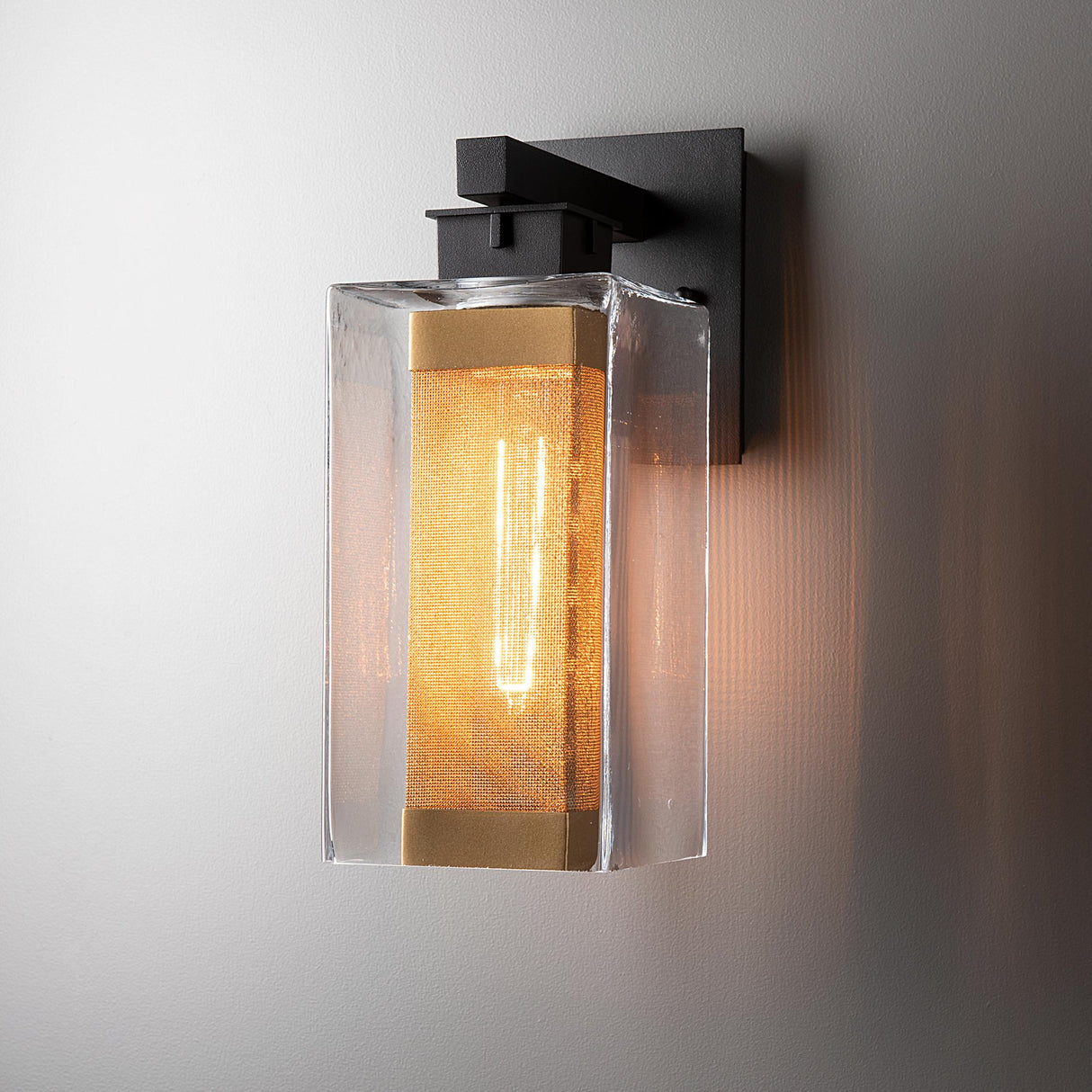 Hubbardton Forge 2021 Coastal Black Coastal Gold Clear Glass (ZM) Polaris Outdoor Medium Sconce
