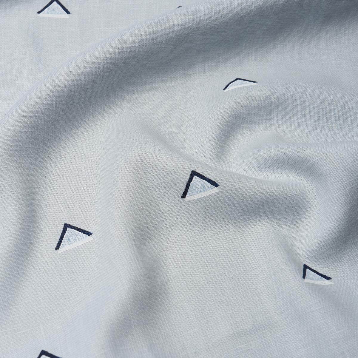 Schumacher Overlapping Triangles Navy And White On Sky Fabric