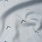 Schumacher Overlapping Triangles Navy And White On Sky Fabric
