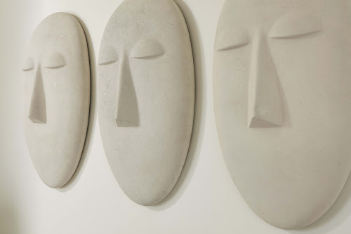 Phillips Collection Emerging Face Wall Art Roman Stone Accent