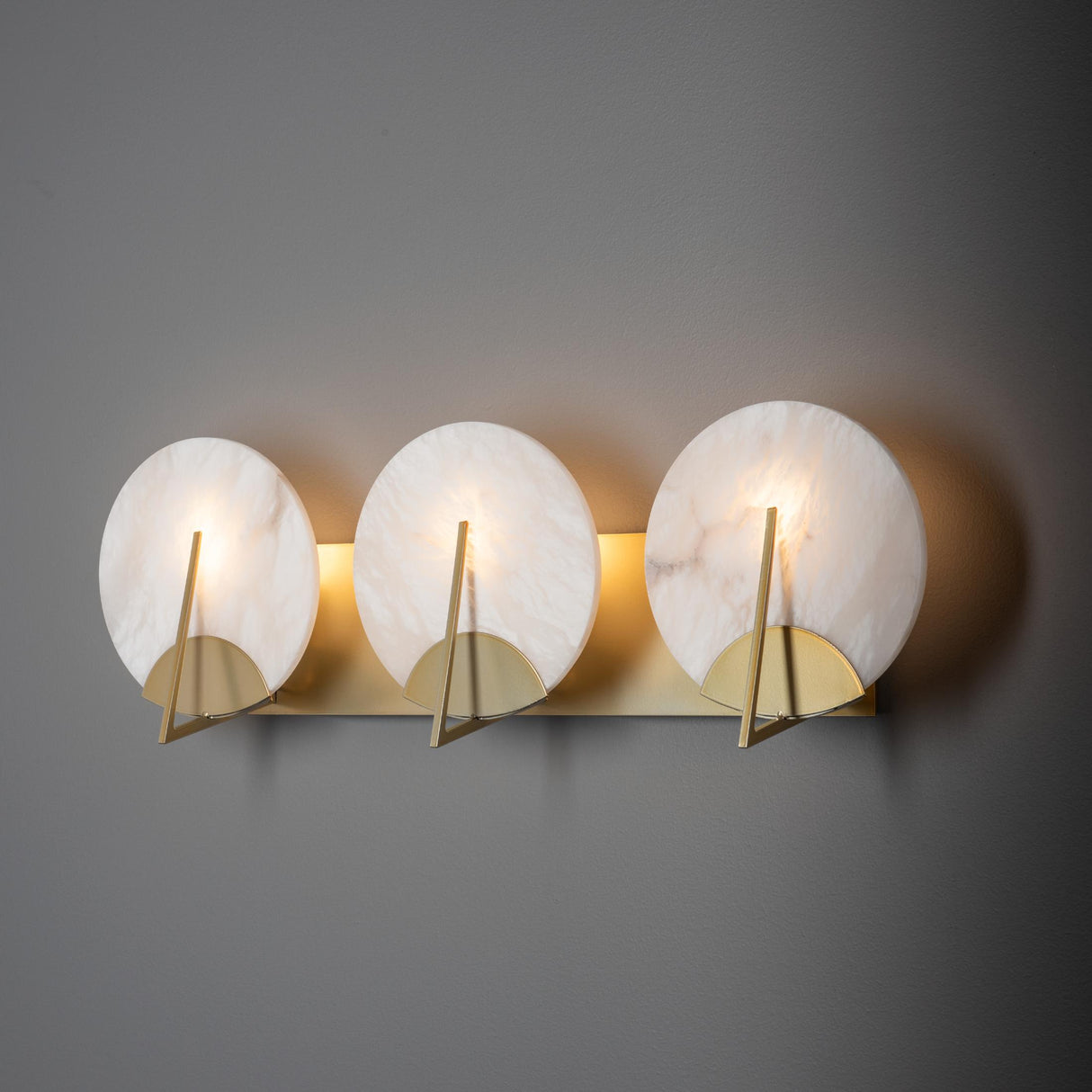 Hubbardton Forge 2025 Modern Brass Alabaster Callisto 3-Light Bath Sconce