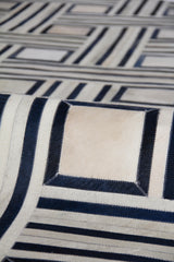 Exquisite Rugs Natural Hide Handmade Leather Hide in 2167 Ivory/Blue/Multi 5' x 8' Area Rug