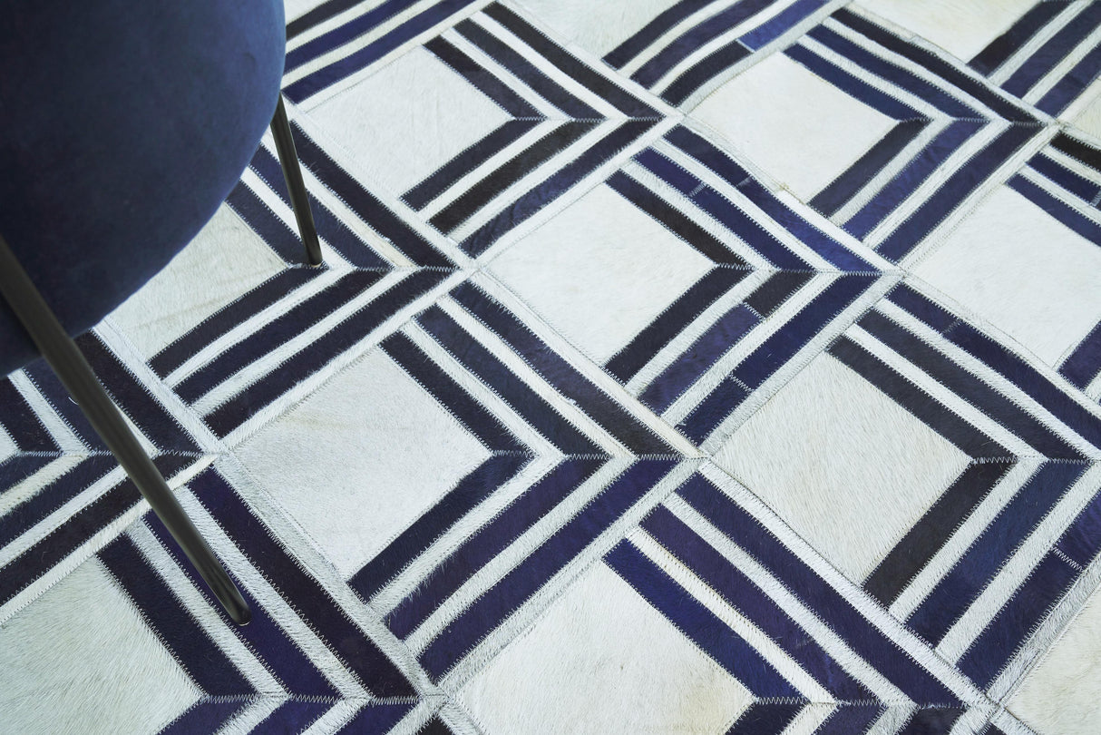 Exquisite Rugs Natural Hide Handmade Leather Hide in 2219 Navy/Multi 5' x 8' Area Rug