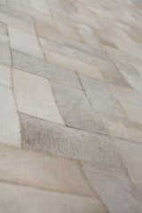 Exquisite Rugs Natural Hide Handmade Leather Hide in 3354 Ivory/Multi 10' x 13' Area Rug