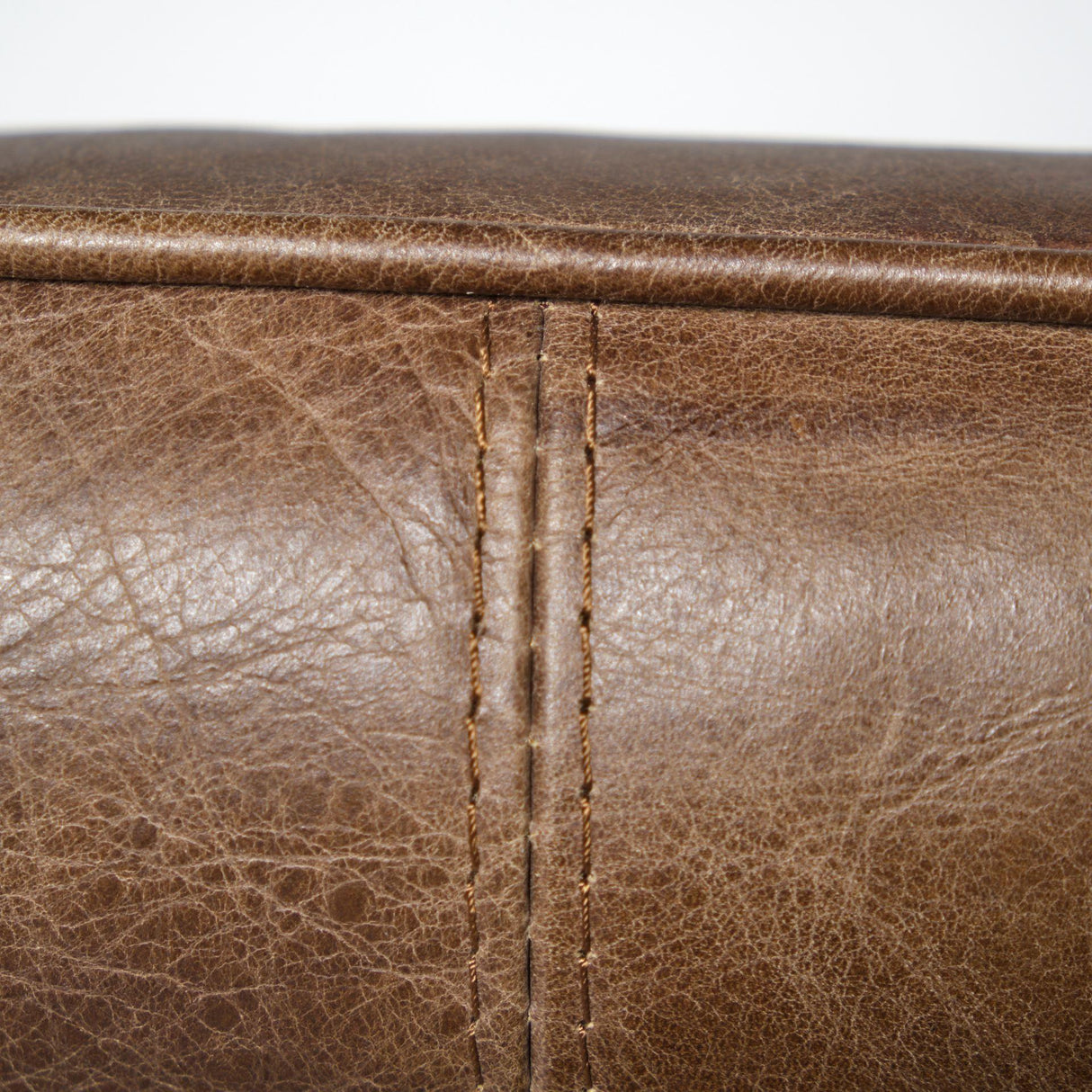 Mercana Flavelle I Brown Leather Cushion Seat and Solid Iron Base Accent Chair
