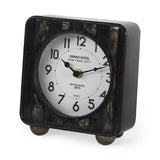 Mercana Karl 6.0L x 3.0W x 6.8H Rustic Black Iron Rounded Square Table Clock