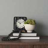 Mercana Karl 6.0L x 3.0W x 6.8H Rustic Black Iron Rounded Square Table Clock