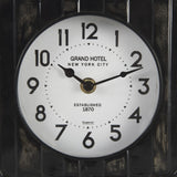 Mercana Karl 6.0L x 3.0W x 6.8H Rustic Black Iron Rounded Square Table Clock