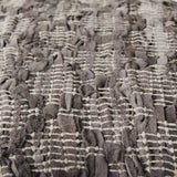 Mercana Falguni 16.0L x 16.0W x 16.0H Gray Leather and Cotton Patterned Pouf