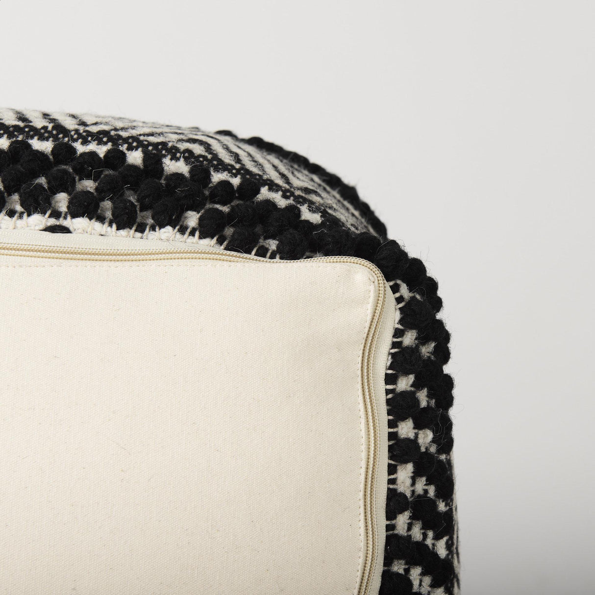 Mercana Garima 22.0L x 22.0W x 14.0H Black/White Wool and Cotton Patterned Pouf