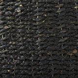 Mercana Dina 75L x 75W x 45H Black Cornhusk and Water Hyacinth Round Coffee Table Pouf