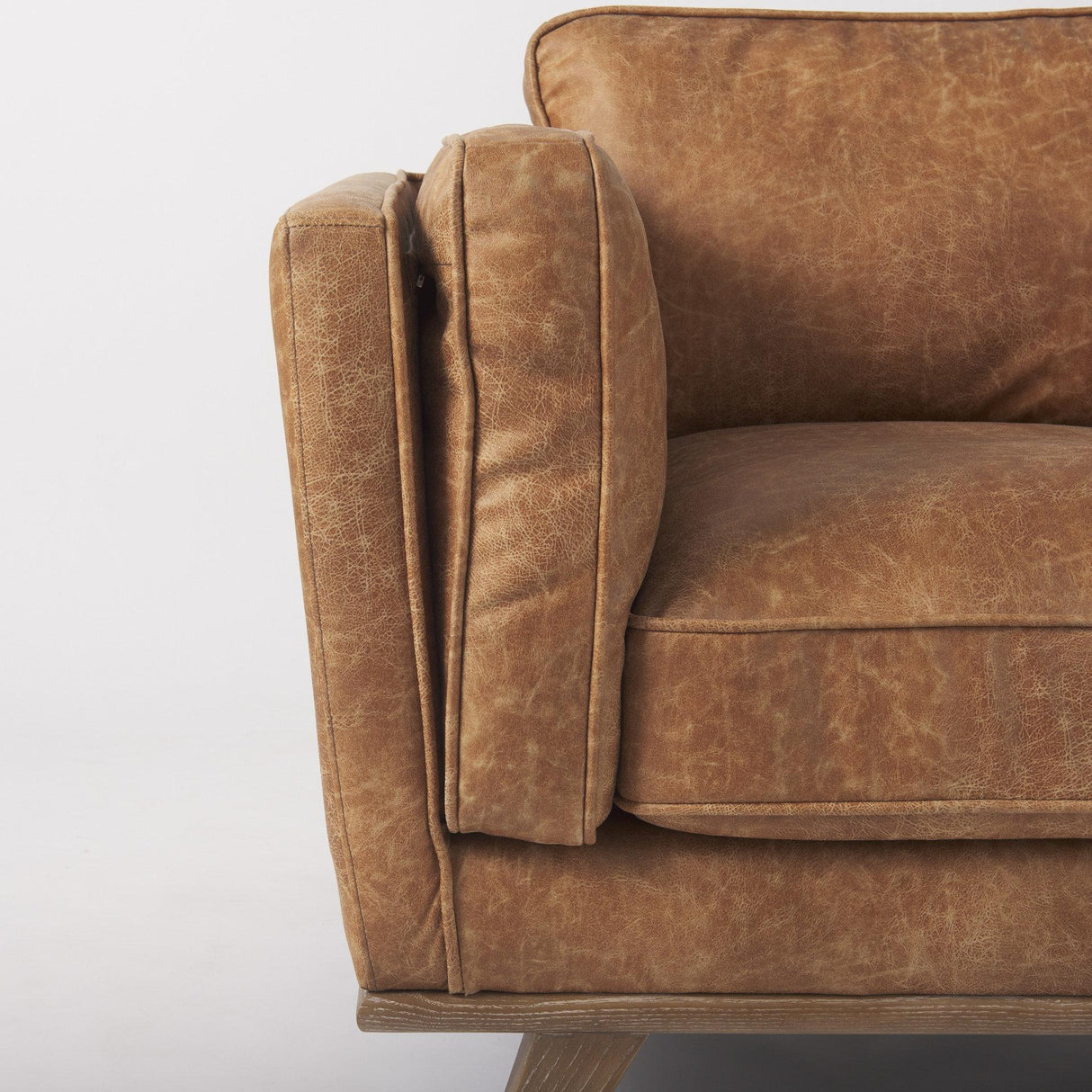 Mercana Brooks 41.7L x 34.8W x 33.5H Cognac Brown Faux Leather Chair W/ Medium Brown Wooden Legs