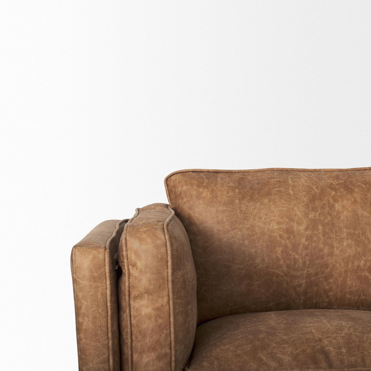 Mercana Brooks 90.2L x 34.8W x 33.5H Cognac Brown Faux Leather Three Seater Sofa W/ Medium Brown Wooden Legs