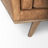 Mercana Brooks 90.2L x 34.8W x 33.5H Cognac Brown Faux Leather Three Seater Sofa W/ Medium Brown Wooden Legs