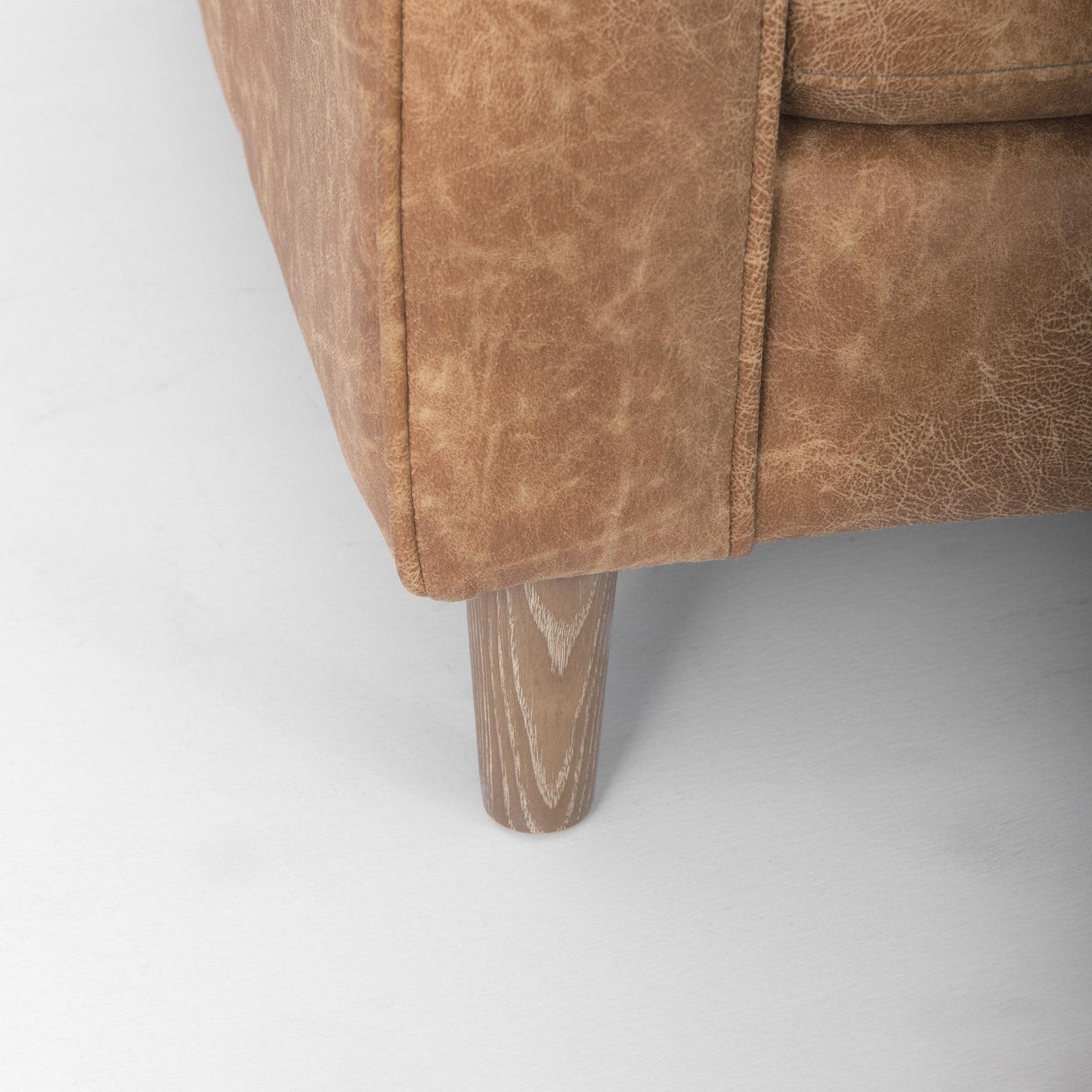 Mercana Loretta 88.0L x 36.2W x 33.9H Cognac Brown Faux Leather Three Seater Sofa with Two Bolster Cushions