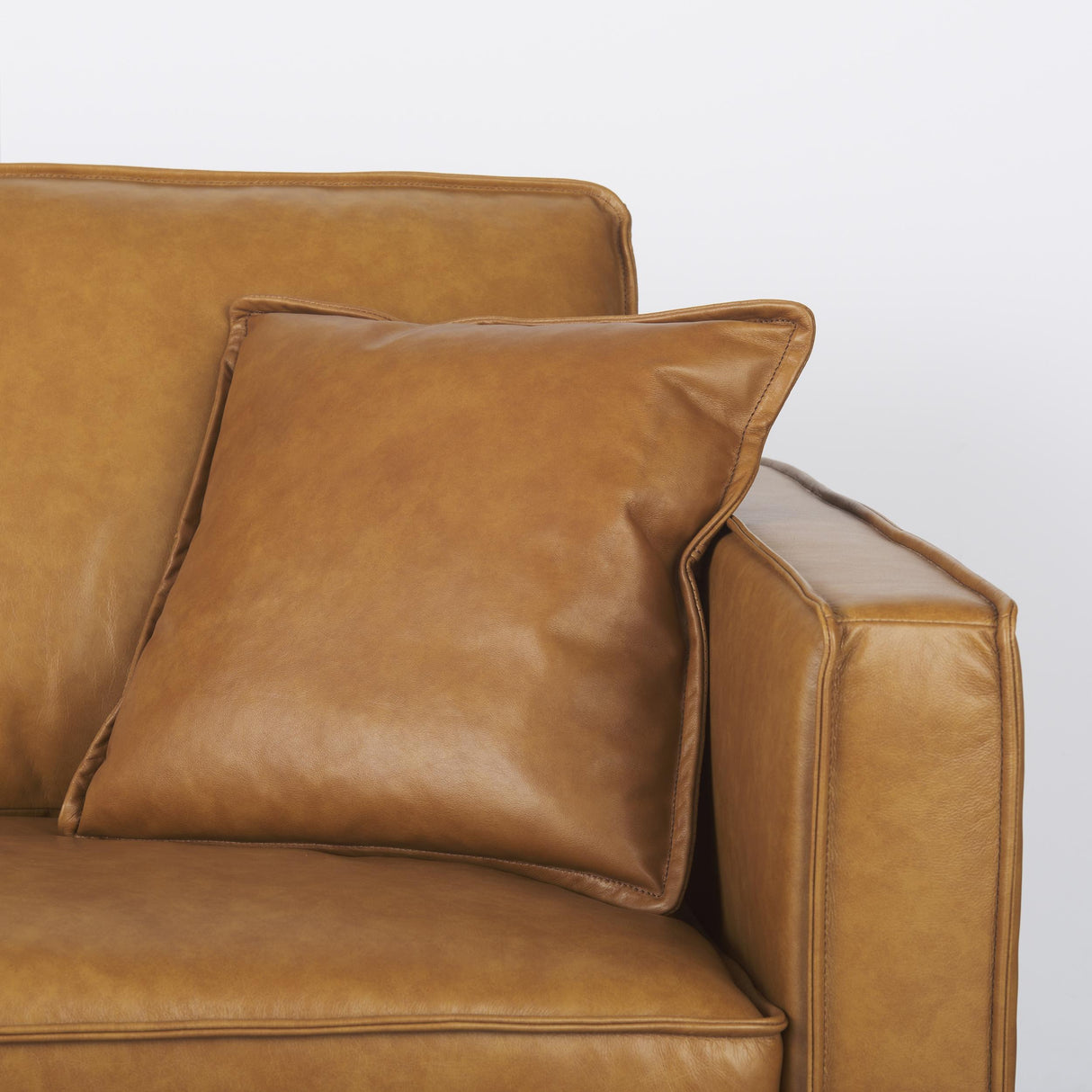 Mercana D'Arcy 111"L x 70"D x 33"H Tan Leather Left Chaise Sectional