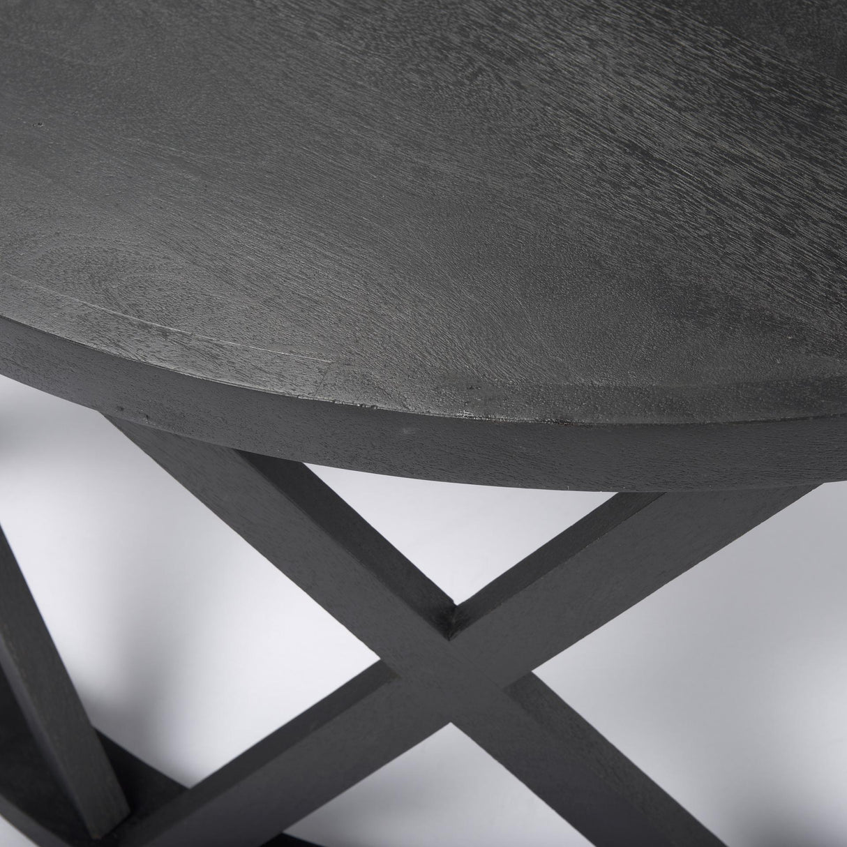 Mercana Forsey 28.0L x 45.3W x 18.0H Black Solid Wood Round Coffee Table