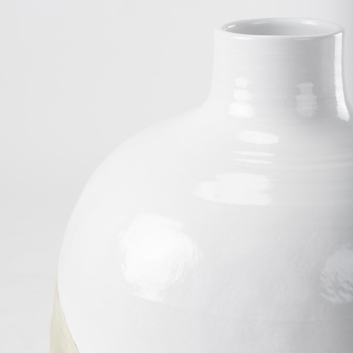 Mercana Amos 18.5L x 18.5W x 24.4H White and Dark Beige Color Blocked Ceramic Floor Vase
