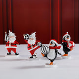 Zodax Festive Four Santa & Penguin Figurines, Set of 4, Holiday Decoration, 7" Tall